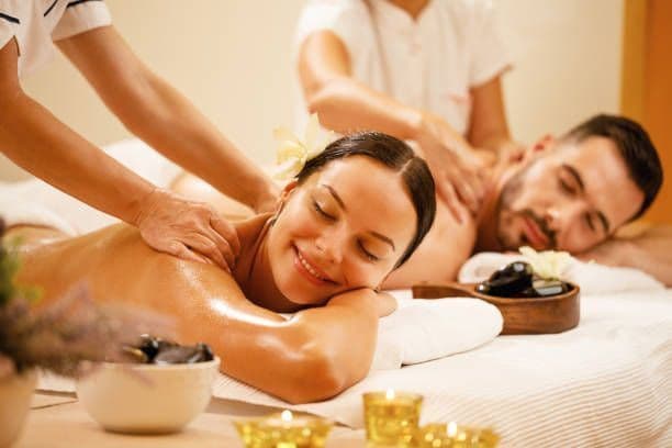 Therapist giving a full body massage in Delhi